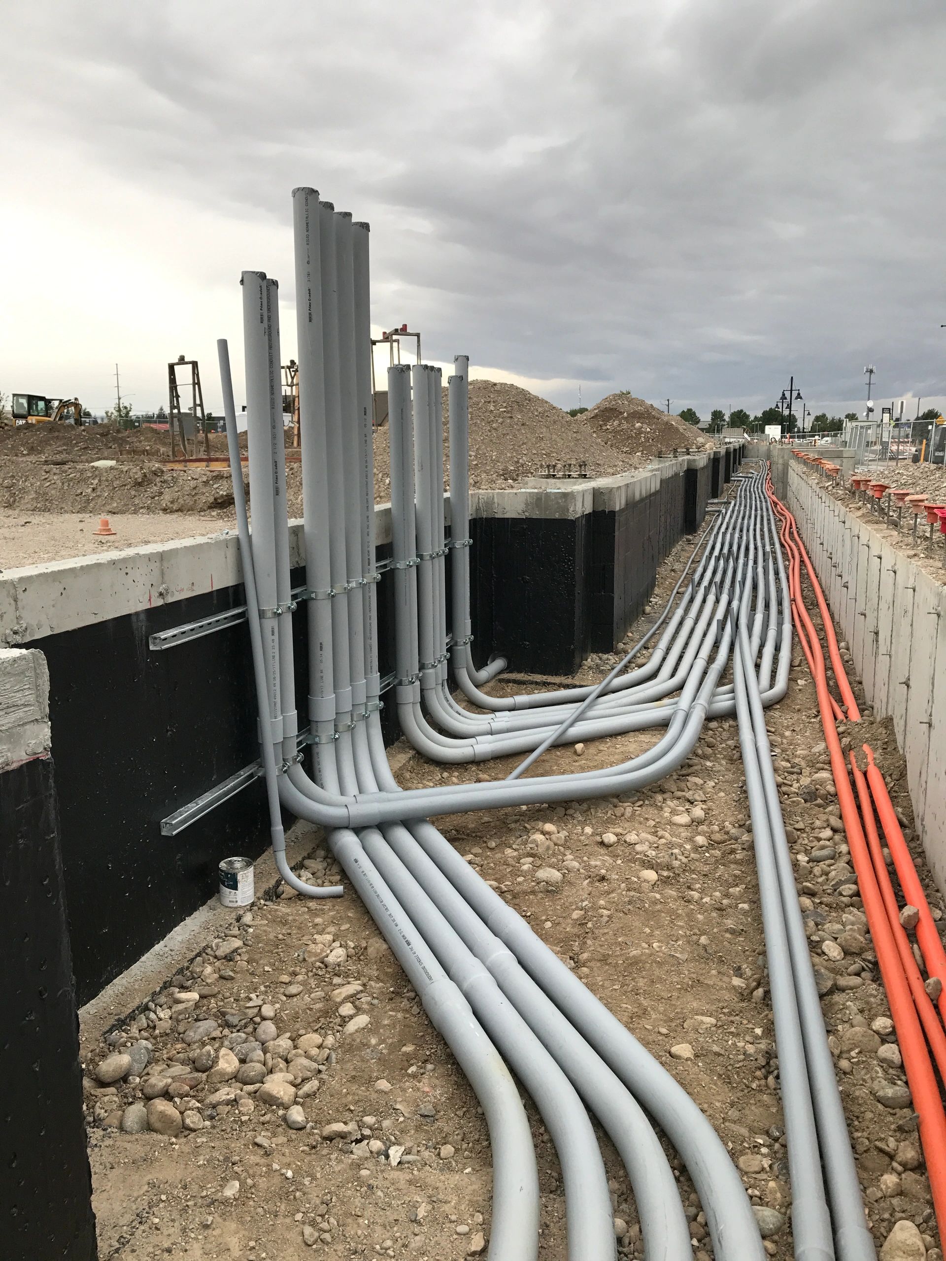 Electrical conduits in a construction trench